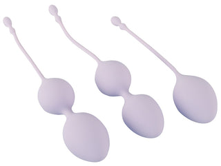 Set med tre ljuslila kegelbollar i silikon med återvinningssnören, visas på en vit bakgrund.