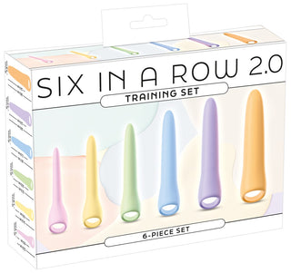 Förpackning innehållande sex pastellfärgade silikondilatatorer med en slät, avsmalnande form, placerade i en rad.