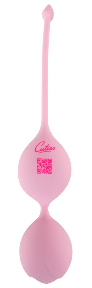 Rosa dubbla kärleksbollar i silikon med utdragningssnöre, med ”Cuties”-mönster för bäckenbottenträning.