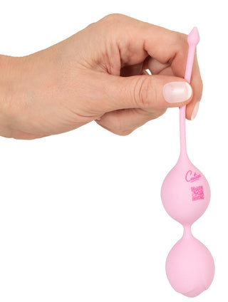 Rosa silikonbollar ”Double Love Ball Knipkulor Cuties” med ögla som handtag och synlig logotyp.