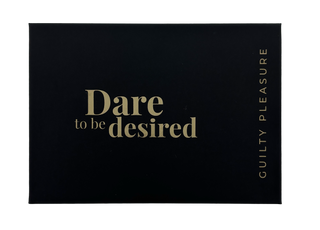 Snygg svart låda med guldtext: Våga vara önskad och GUILTY PLEASURE på sidan - med Crave Bulletvibrator, en vattentät bulletvibrator med USB-uppladdning för ultimat tillfredsställelse.