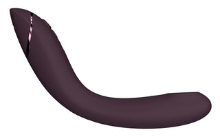 Womanizer OG är en elegant, mörklila enhet med en metallisk sidoaccent, med en böjd design och flera vibrationslägen för ökad mångsidighet.
