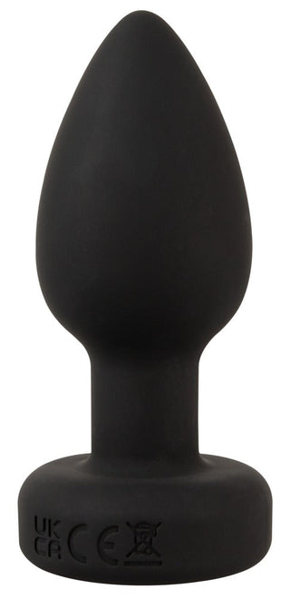 En svart LED Buttplug med Vibration med en utsvängd bas står upprätt mot en vit bakgrund, med elegant silikondesign och lekfull LED-belysning.