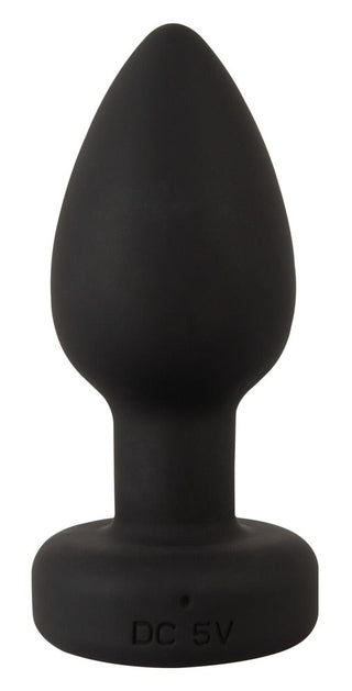 LED Buttplug med Vibration, en svart silikonplugg med en utsvängd bas, visas mot en vit bakgrund.