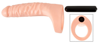 Double Fucker Med Vibration är en köttfärgad ihålig strap-on utrustad med en svart kulvibrator och ringfäste för dubbel penetrationsglädje.