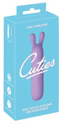 Blå låda med lila minivibrator läser "Mini Vibrator Cuties Med öron." Den uppladdningsbara Silk Touch Silicone-designen säkerställer en sublim känsla och perfekt vibration varje gång.