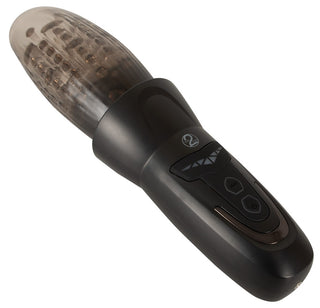 Stroker Penis Masturbator är en svart handhållen automatisk masturbator för män, med kontrollknappar, vibration för män och en texturerad transparent hylsa.