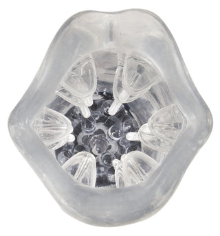 Masturbator med 360° Massage är en roterande masturbator i transparent, texturerad silikon som visas ovanifrån och avslöjar dess mjuka, spetsiga inre strukturer.