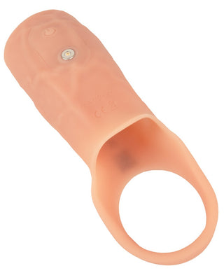 Penis Sleeve Öppen Realistixxx, tillverkad av köttfärgad silikon för träningsspårning, har en realistisk design med en öppen ände. Den har en sidoknapp och liten indikatorlampa för extra funktionalitet.