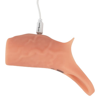 Penis Sleeve Öppen Realistixxx är en beige, texturerad silikonhylsa med en handtagsliknande funktion och USB-laddningskabel. Den har venliknande mönster för en realistisk design.