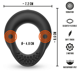 Vibrerande Ballring Rebel är en svart, ovalformad vibrerande bollring med mått och funktionsikoner som visar dess vibrationsfunktion, vattentäta design och kroppssäkra silikon för förbättrat erektionsstöd.