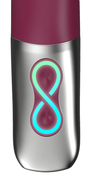 Titanz G-punktsvibrator är en metallisk, uppladdningsbar enhet med elegant design och en glödande turkos timglasformad knapp för en premiumupplevelse.