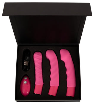 Vibepad RIDE ON är ett svart boxset med en rosa handsfree-stimulatorvibrator, tre tillbehör, en fjärrkontroll och en USB-laddningskabel.