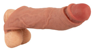 En närbild av Vibro Sleeve med Ballring, som har en textur som liknar den hos en penissleeve.