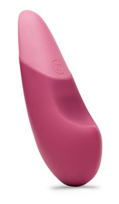 Womanizer Vibe Klitorisvibrator, en ergonomiskt designad massageapparat i rosa med UltraWave-teknik, har en slät finish och står upprätt mot en vit bakgrund.