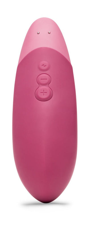Womanizer Vibe Klitorisvibrator är en rosa handhållen enhet med UltraWave-teknologi, med knappar på toppen och en rundad design.