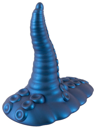 Tentacle Pad Sit On Vibrator är en blå, tentakelformad vibrator med en strukturerad yta och runda bulor, med en bred bas för handsfree-stimulering.