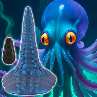 En blå bläckfisk med gula ögon står bredvid Tentacle Pad Sit On Vibrator och en liten svart fjärrkontroll.