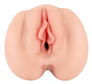 En närbild av Realistixxx RealMasturbator Lösvagina, tillverkad av Natureskin-material för en realistisk masturbatorupplevelse.