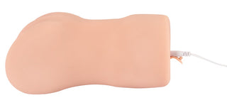 Realistixxx RealMasturbator Lösvagina är en köttfärgad onanileksak tillverkad av Natureskin-material, med en sladd på sidan, och visas mot en vit bakgrund.