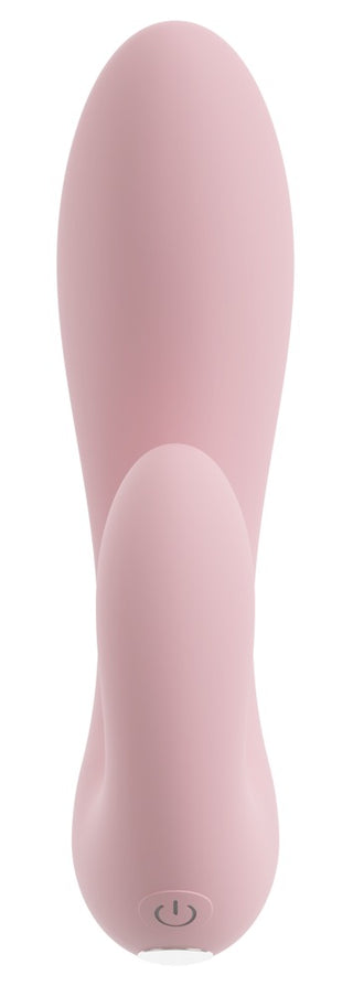 CERYA Rabbitvibrator är en rosa minivibrator i silikon med en strömknapp vid basen, utformad för vaginal och klitorisstimulering, mot en vit bakgrund.