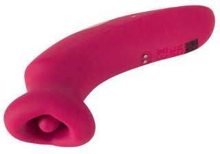 Rosa silikonvibrator med böjd design, rundad spets och sugöppning.