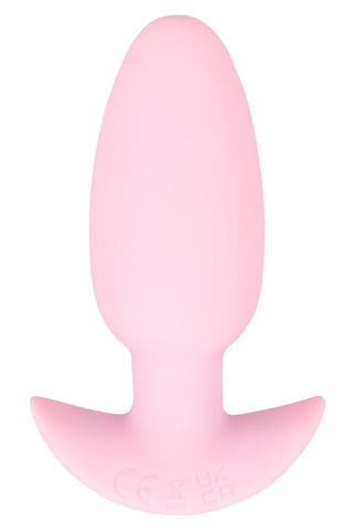 Cuties Mini Vibrating Plug är en rosa analplugg i silikon med en utsvängd bas, perfekt för analplugg nybörjare, visad mot en vit bakgrund.