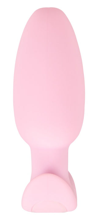Cuties Mini Vibrating Plug är en rosa analplugg i silikon med en utsvängd bas, perfekt för nybörjare, visad mot en vit bakgrund.