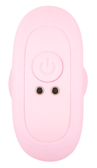 Cuties Mini Vibrating Plug är en liten, rosa, uppladdningsbar enhet med en strömbrytare och två hål, perfekt för nybörjare som söker mild analstimulering.