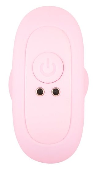 Cuties Mini Vibrating Plug är en liten, rosa, uppladdningsbar enhet med en strömbrytare och två hål, perfekt för nybörjare som söker mild analstimulering.