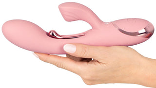 Beau Coeur Avenor G-Spot vibrator i rosa silikon med metalliska accenter, mot en vit bakgrund.