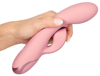 En rosa G-punktsvibrator i silikon med böjd design och ergonomiskt handtag.
