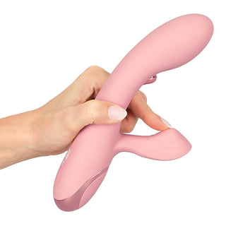 Rosa, böjd rabbitvibrator med metallspets utformad för stimulering av G-punkten.