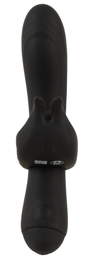 Svart silikonvibrator med kaninörondesign, med en elegant, böjd form för dubbel stimulering.