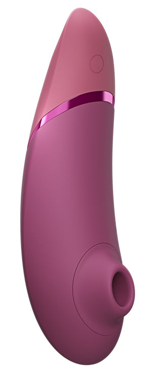 Böjd stimulator i rosa silikon med cirkulär öppning och Pleasure Air-teknik.