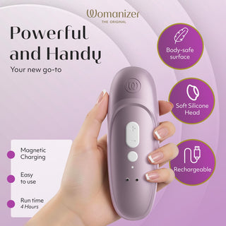 Purple Womanizer Pro klitorisstimulator med magnetisk laddning, kroppssäkert material och uppladdningsbar design.