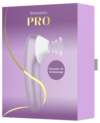 Womanizer Pro Klitorisstimulator i lila med guldfärgade accenter, med snygg design och slätt material.