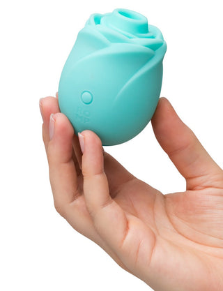 ROMP Rose Glow Klitorisstimulator i rosa med slät silikondesign och Pleasure Air-teknik, visas mot en vit bakgrund.