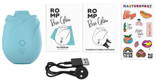 ROMP Rose Glow klitorisstimulator i rosa silikon med böjd ergonomisk design mot en vit bakgrund.
