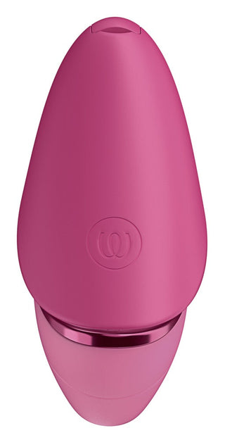 Rosa, oval klitorisstimulator i silikon med 3D-lufttrycksteknik, sedd ovanifrån.