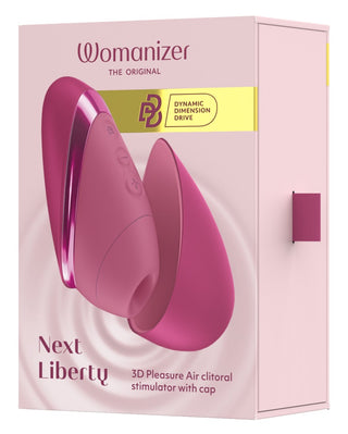 Rosa silikonstimulator av märket Womanizer Next Liberty med lufttryck, i en märkesförpackning.