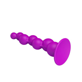 Analplugg i lila silikon med rund, utsvängd bas, 17 cm, mot vit bakgrund.