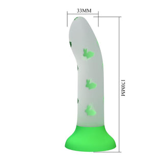 Självlysande silikondildo i ljus färg, rundad spets, kaninformad bas med sugkopp, 170 mm lång, 33 mm bred.