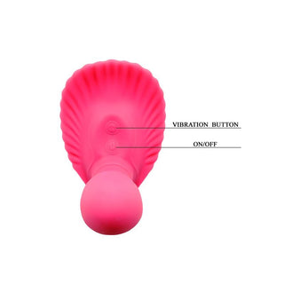Skalformad handsfree-vibrator i rosa silikon med kontrollknappar på framsidan.
