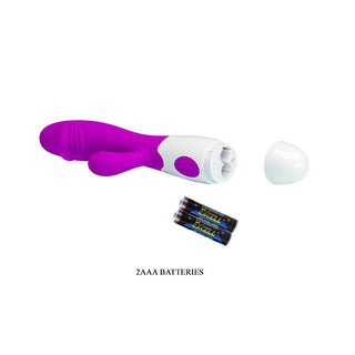 PrettyLove Snappy Purple rabbit-vibratorn, utformad för stimulering av G-punkten, visas på en vit bakgrund med locket av och två AAA-batterier bredvid den.