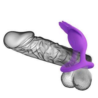 Silas Vibrerande Penisring är en USB-uppladdningsbar, handformad, lila leksak designad att lindas runt basen av en penis och erbjuder 7 vibrationslägen, avbildade på en gråskaleritning för demonstration.