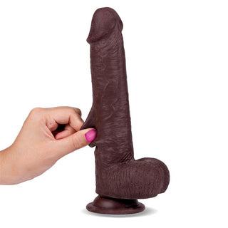Slidy Dildo Dual Layer, 22 cm, silikon, konstruktion i två lager med kraftig sugfot, avbildad mot vit bakgrund.