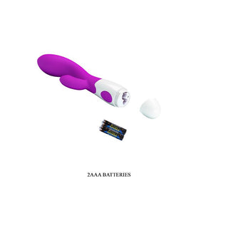 Lila och vit kaninvibrator i silikon med batterilocket borttaget, mot en vit bakgrund.