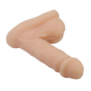 Köttfärgad, kompakt 13 cm dildo av TPE, mot en vit bakgrund.