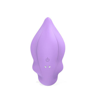 Engily Ross Donnyel Trosvibrator, en lila lövformad elektronisk enhet gjord av förstklassigt silikon, vilar elegant på en vit bakgrund med strömbrytaren tydligt synlig.